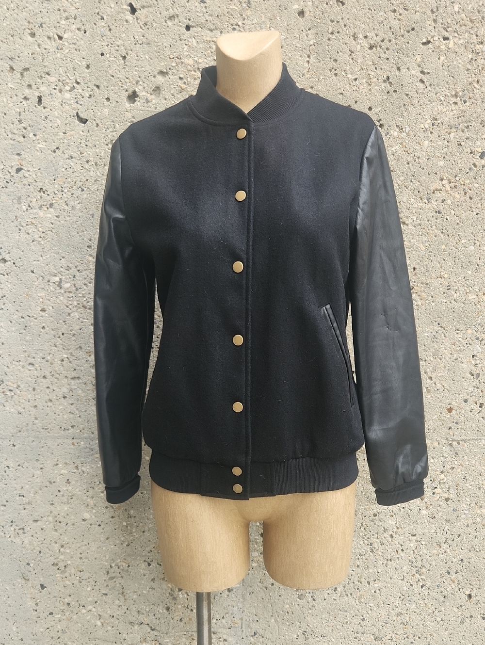 Hilary McMillian black varsity jacket
